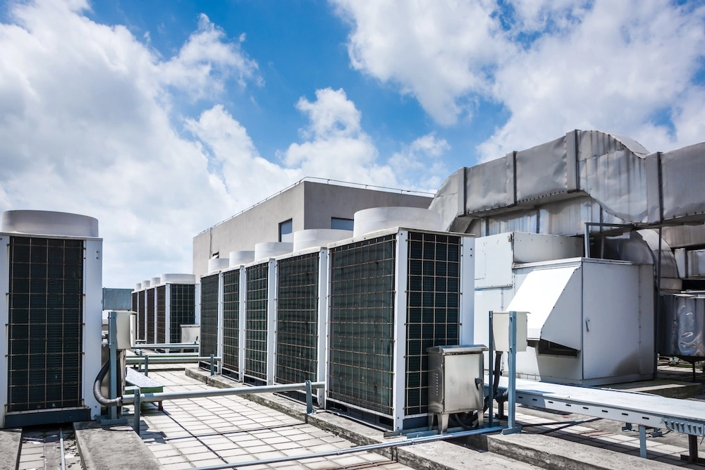 Light commercial hvac units on roof hot sunny day